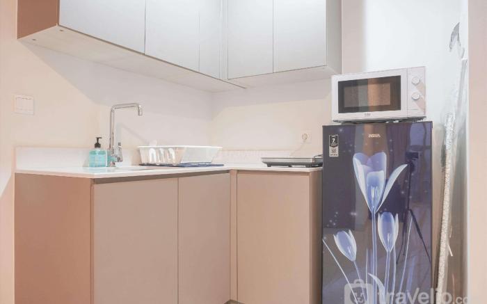 Fancy & Comfort 1BR at Gold Coast Apt By Travelio