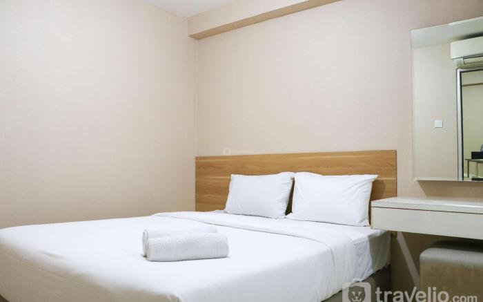 Cozy Living & Tidy 2BR Green Bay Pluit By Travelio