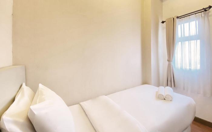 Simply Homey 2BR at Suites @Metro Apt By Travelio