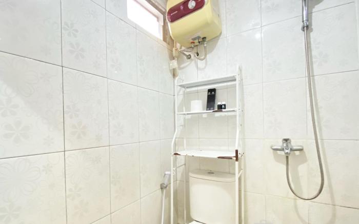 Simply Homey 2BR at Suites @Metro Apt By Travelio