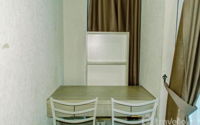 Homey and Warm Studio Room at Tifolia By Travelio