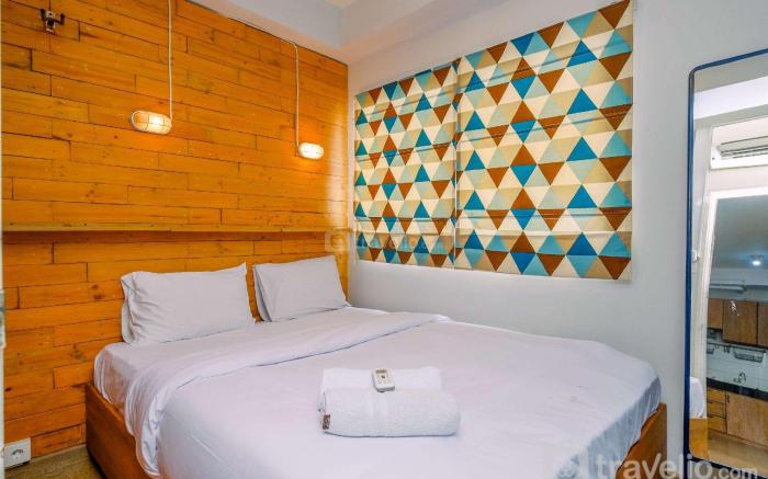 Comfort 1BR at Pakubuwono Terrace By Travelio