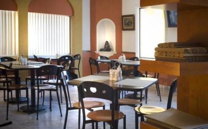 Estanza Hotel & Suites