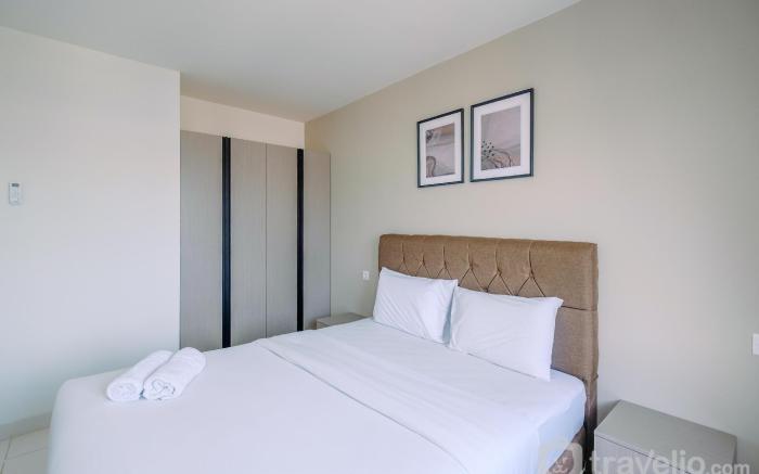 Homey Comfy 2BR at Sentul Tower Apt By Travelio