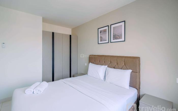 Homey Comfy 2BR at Sentul Tower Apt By Travelio