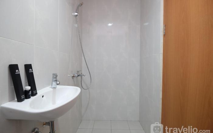Nice 2BR 26th Floor Evenciio Margonda By Travelio