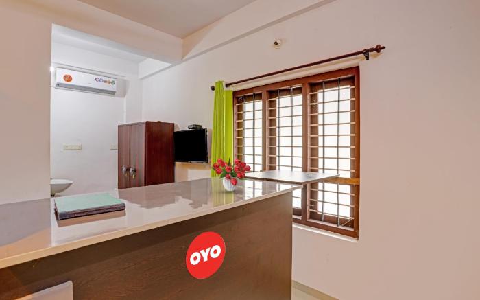 Hotel O Parppidam Residency Kazhakuttam Railway Station