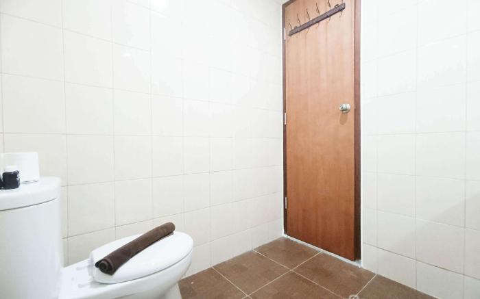 SpaciousComfort 3BR Vida View Makassar By Travelio