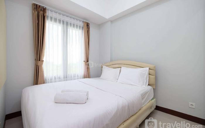 Comfort and Modern 2BR Royal Heights By Travelio