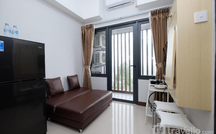 Comfort and Modern 2BR Royal Heights By Travelio