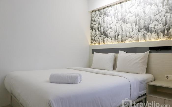 Warm & Minimalist 2BR Green Bay Pluit By Travelio