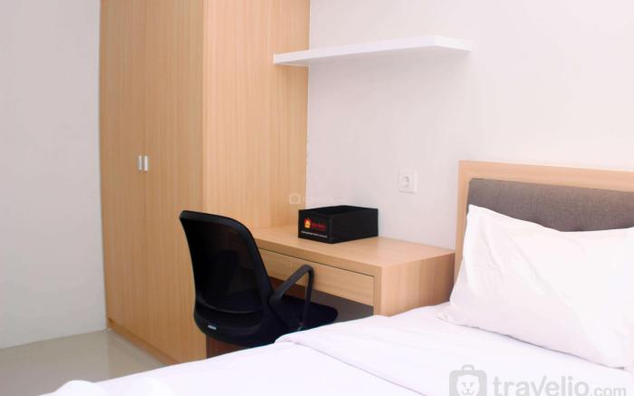 Comfort 1BR Vasanta Innopark Apartment By Travelio