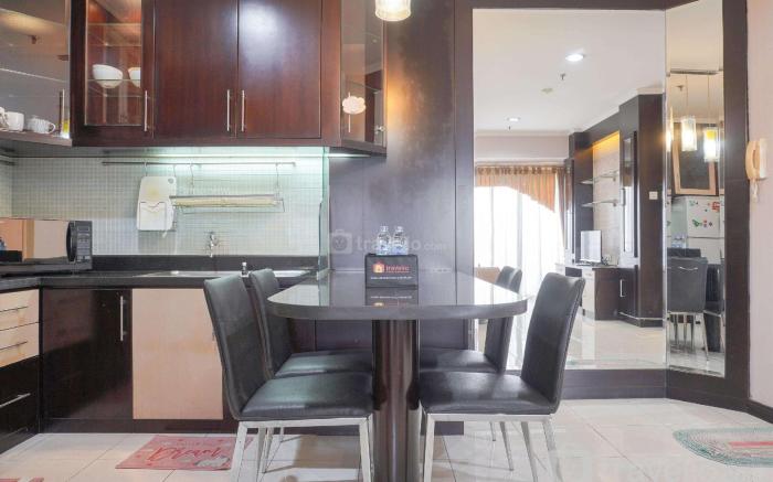 Cozy and Simply Look 2BR Puri Garden By Travelio