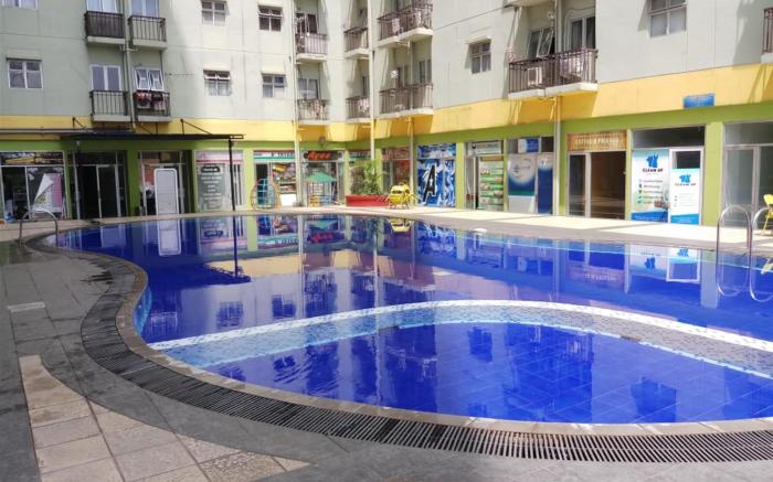 Homey and Cozy Studio at Suites Metro By Travelio