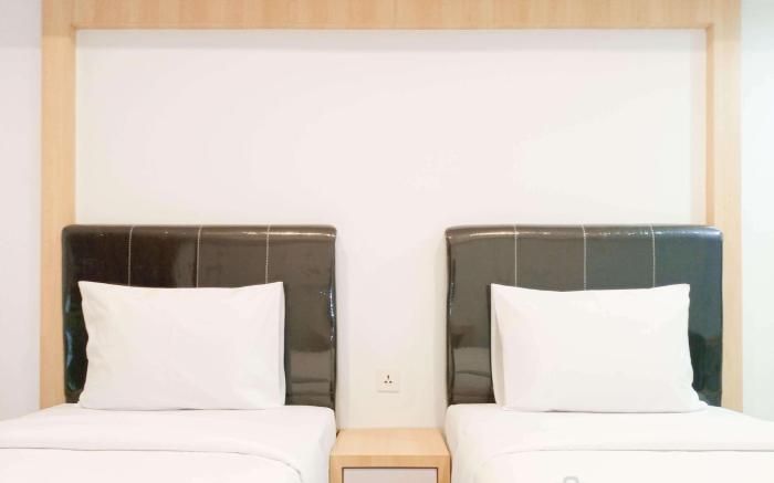 Cozy Studio Room at De Prima Apartment By Travelio