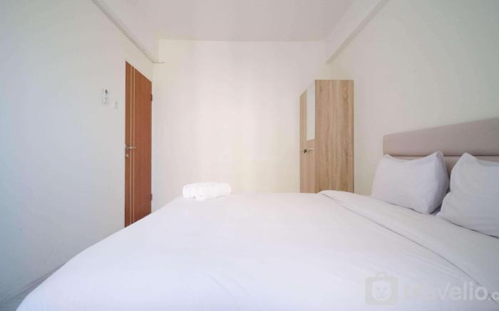 Best Choice 2BR at Puncak Dharmahusada By Travelio