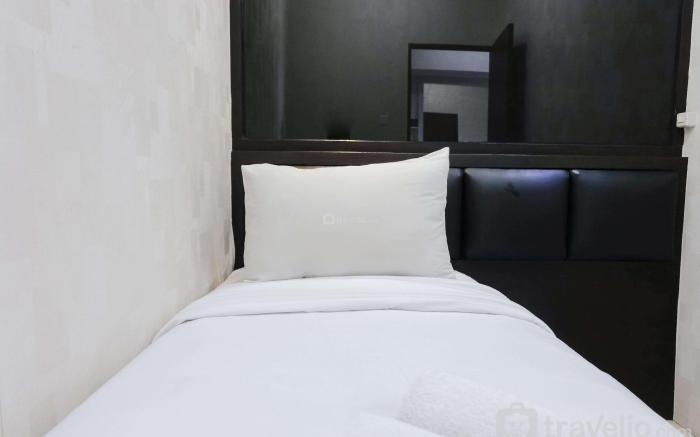 Homey and Cozy 2BR Tamansari Panoramic By Travelio