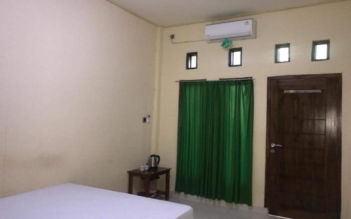 Hotel O Penginapan Mc Lodge