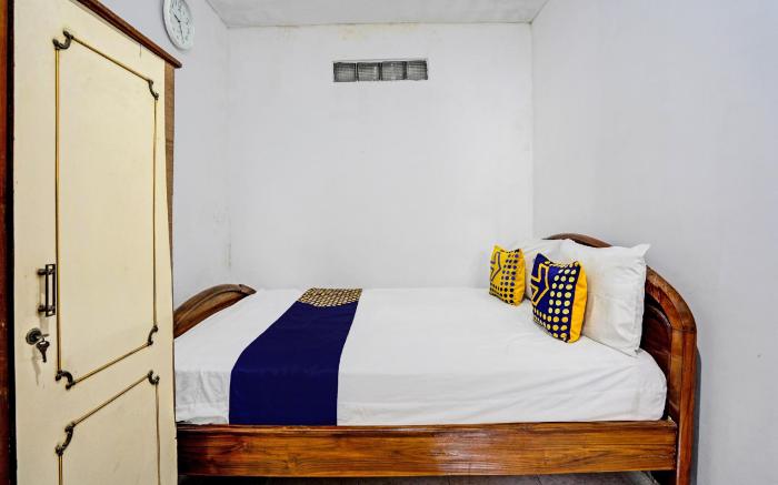 SPOT ON 92595 Umi Homestay Syariah