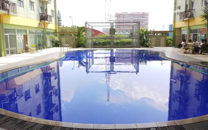 Best Deal 2BR Apartment Suites @Metro By Travelio