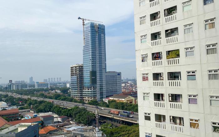 Cozy Stay 1BR at Green Pramuka City By Travelio
