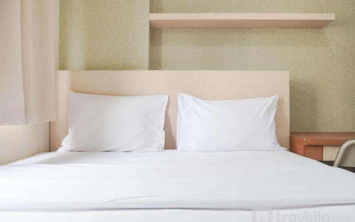 Cozy Stay 1BR at Green Pramuka City By Travelio