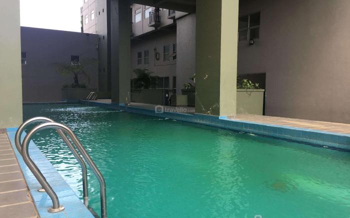 Simple Homey 2BR at Grand Asia Afrika By Travelio