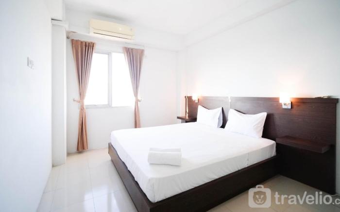 Simple 2BR Extra Bed at Menara Rungkut By Travelio