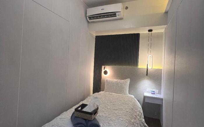 E & T Homecation 2 Bedroom at SMDC AIR Residences