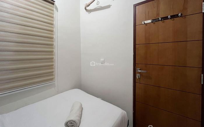 Warm & Cozy 2BR Vida View Makassar Apt By Travelio