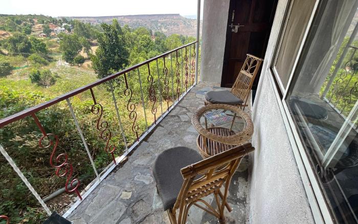Balcony room with massive hall
