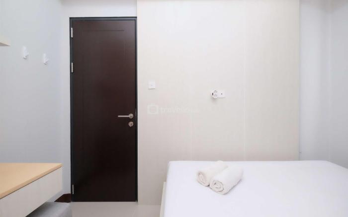 Comfortable 2BR Royal Heights Apt By Travelio