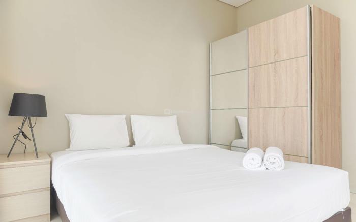 HomeyWarm 1BR at Ciputra International By Travelio