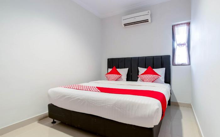 Super OYO 283 Helvetia Residence