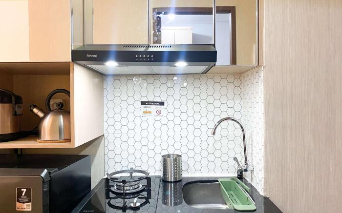 Homey Look Studio @ Transpark Juanda By Travelio