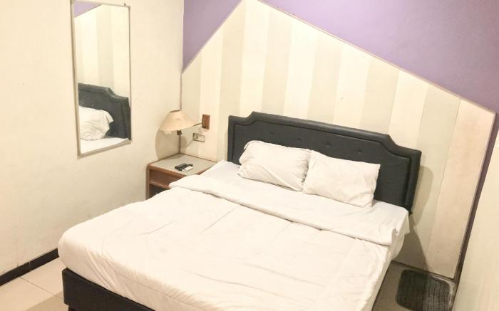 Gangnam Style Residence Mitra RedDoorz near MERR Surabaya