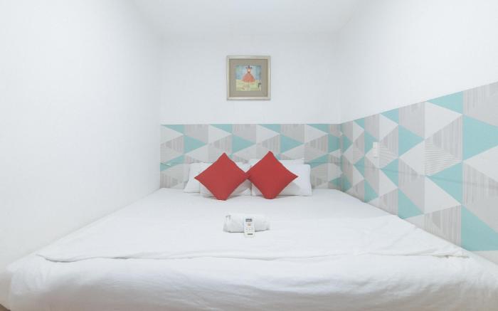 Max Travellers Inn by RedDoorz