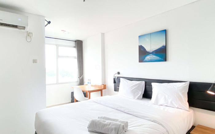 Best Homey Studio at Enviro Apartment By Travelio