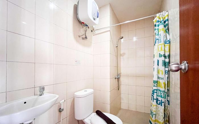 Compact 2BR at Apt Vida View Makassar by Travelio