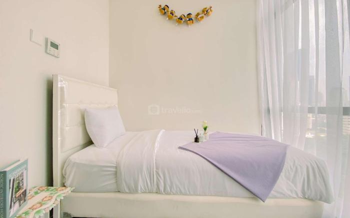 Comfort & Homey 2BR at Sudirman Suites By Travelio