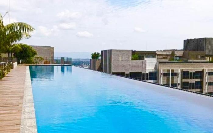 Youth City Studio Rooftop Pool by DKAY