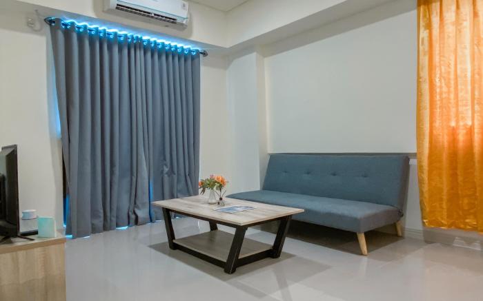 Warm & Homey 1BR at Meikarta Apartment By Travelio