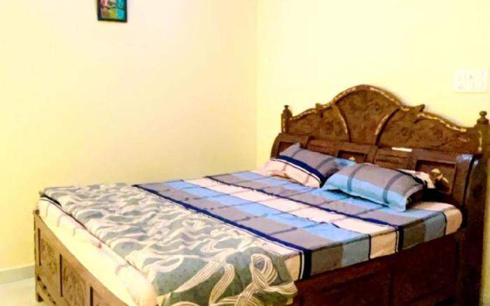 A cozy 1 BHK balcony flat.