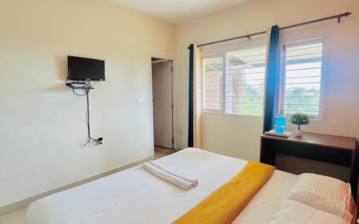 Nilgiris INN Deluxe Room