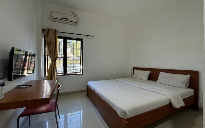 OYO 94244 Ezhar Boka Homestay Near GOR Sulis Bulutangkis
