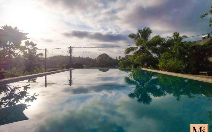 Emel's Retreat by Tropical Magnum