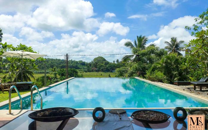 Emel's Retreat by Tropical Magnum