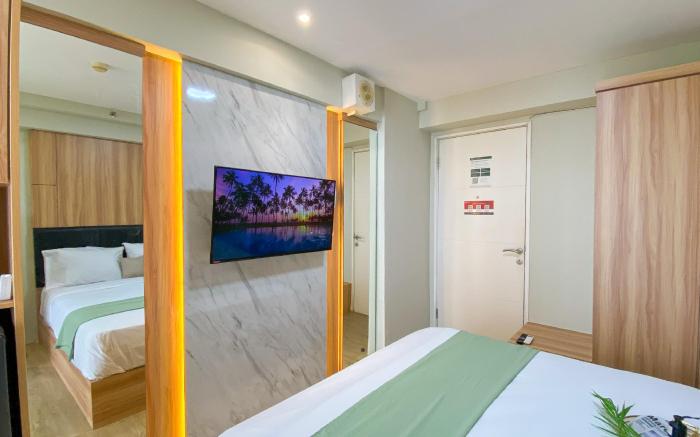 Comfy Minimalist Studio Bassura City By Travelio