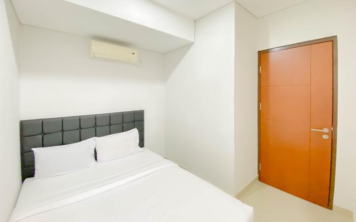 Homey 2BR Apt at Royal Olive Residence By Travelio
