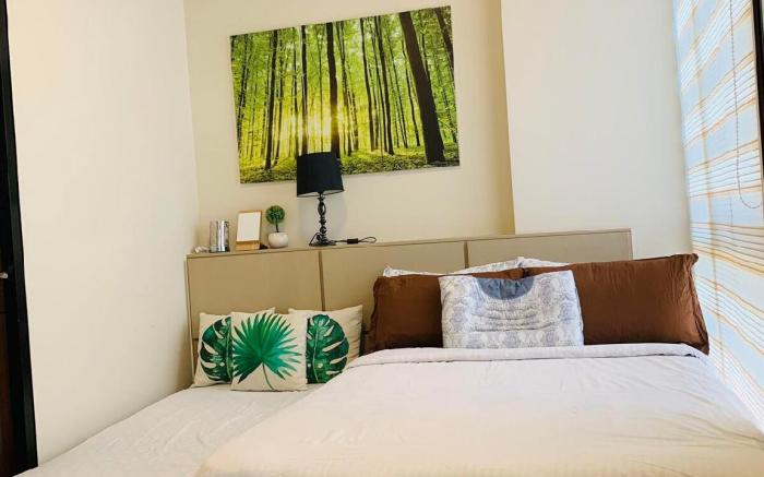 The Mactan newtown Beautiful condo w/ pool & beach